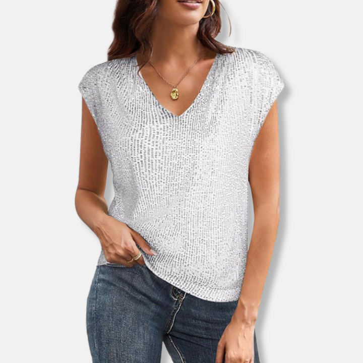Stylish women's shimmering sequin V-neck top. Ideal party wear, offering a relaxed fit for festive evening outfits.