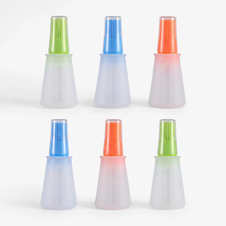 Durable silicone baking brush with internal dispenser. Great for oiling pans, basting meats & pastries, easy to clean.