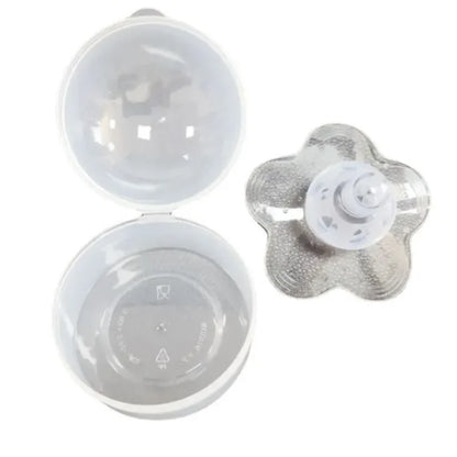 Transparent silicone nipple shield showcasing its thin design for natural feel & effective nipple protection.