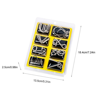 Various metal brain teaser puzzle rings meticulously arranged, a gift for cognitive skill