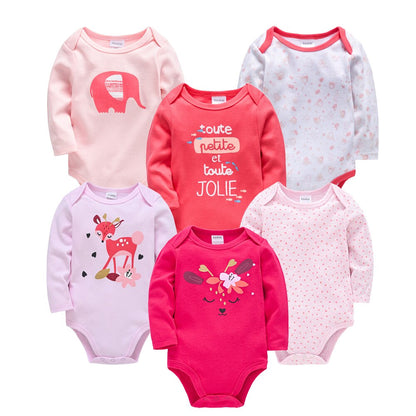 Detailed view of baby boy long sleeve onesie set, showing different cartoon patterns on cotton fabric