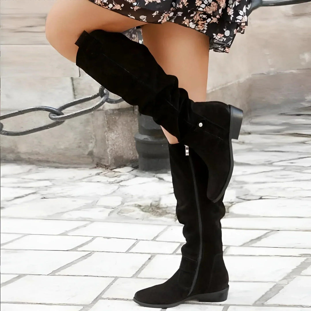 Dressy yet casual women's sleek boots, structured fit, comfortable for versatile wear.