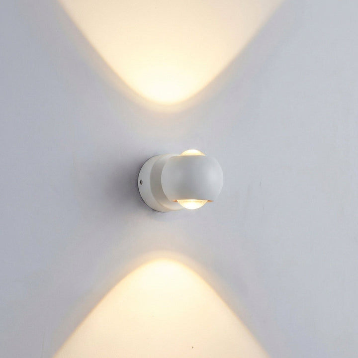 Contemporary Glintara LED wall light, ideal for creating adjustable ambient and accent lighting in modern rooms.