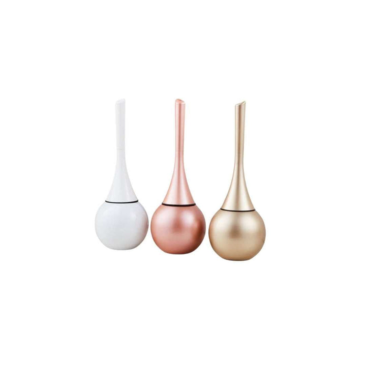 Gold sleek toilet brush, a stylish bathroom accessory for efficient deep cleaning and hygiene.