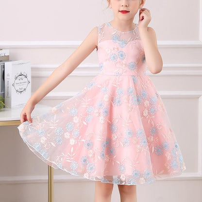 Elegant children's party gown with delicate floral embroidery and lace details.