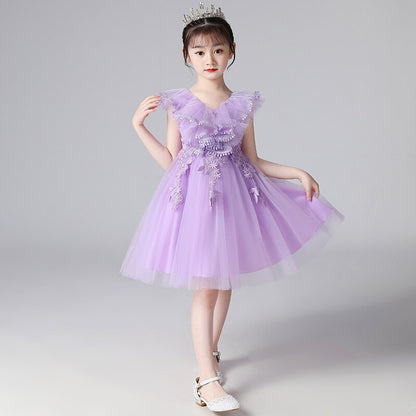 Charming baby girl's princess gown with intricate floral embroidery and soft lace.