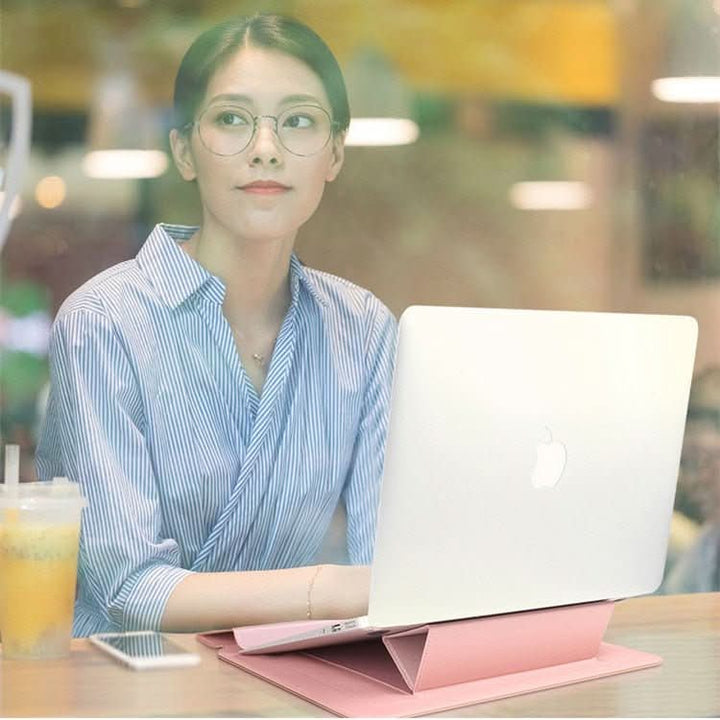 Ergonomic laptop sleeve with integrated stand. Comfortable viewing & typing, device protection.