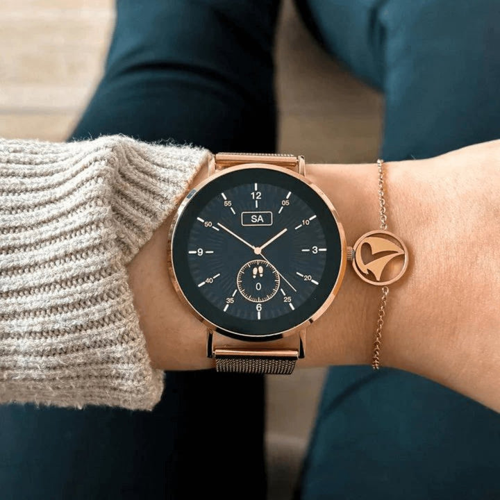 Elegant silver women's smart watch, tracking health metrics, steps, heart rate, and sleep quality.