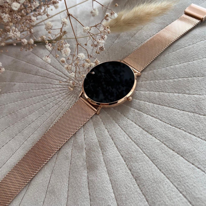 Customizable women's smartwatch, stainless steel, offering activity tracking and smart notifications.