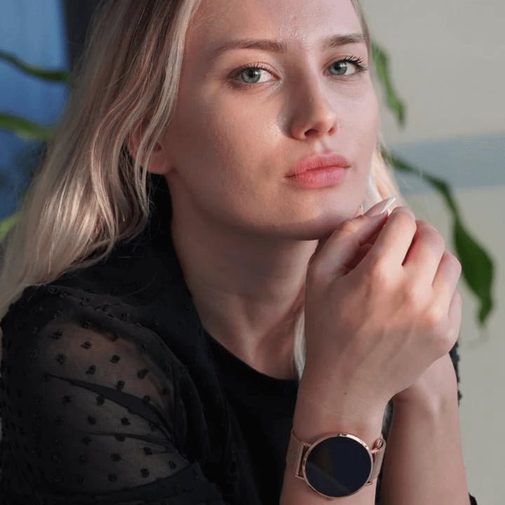Rose gold smart watch for women, slim design, perfect for tracking daily steps, calories & distance.
