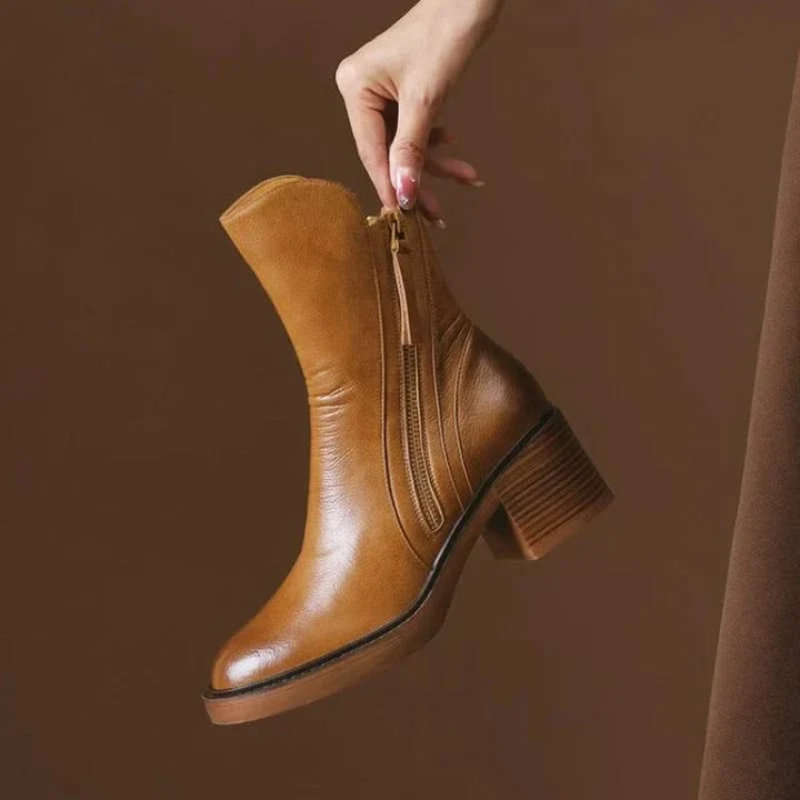 Sophisticated Sloane women's high-heel ankle boots in rich brown leather. Perfect for dressy or everyday.