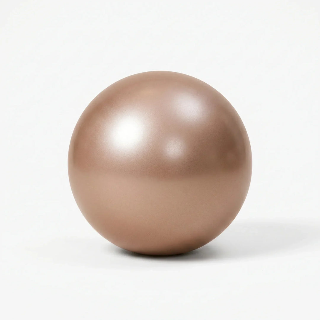 Compact exercise ball for stretching, physical therapy & core strength in home workouts.