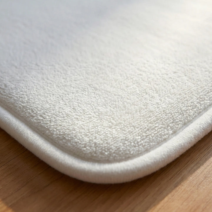 Innovative Flowique smart alarm mat with pressure sensor. Designed for heavy sleepers to wake up & start their morning routine.