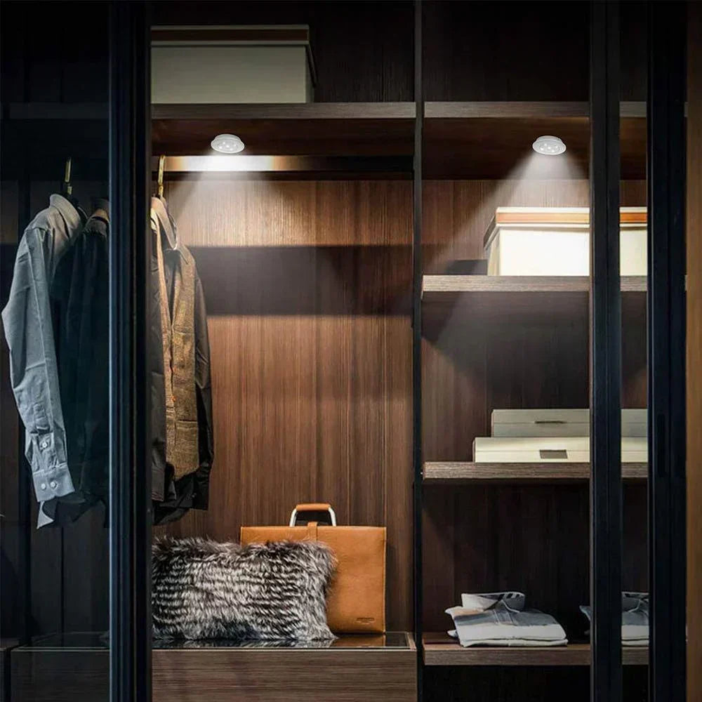 Multi-use smart LED puck lights, wireless for under cabinet, closet, or display shelf accent lighting.