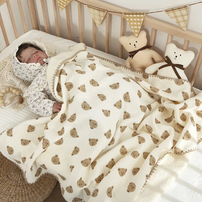 Organic 4-layer cotton baby swaddle blanket, offering breathable comfort for baby's delicate skin