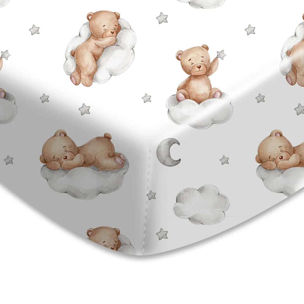 Nursery crib sheet with cute cartoon print, soft and hypoallergenic for sensitive skin.