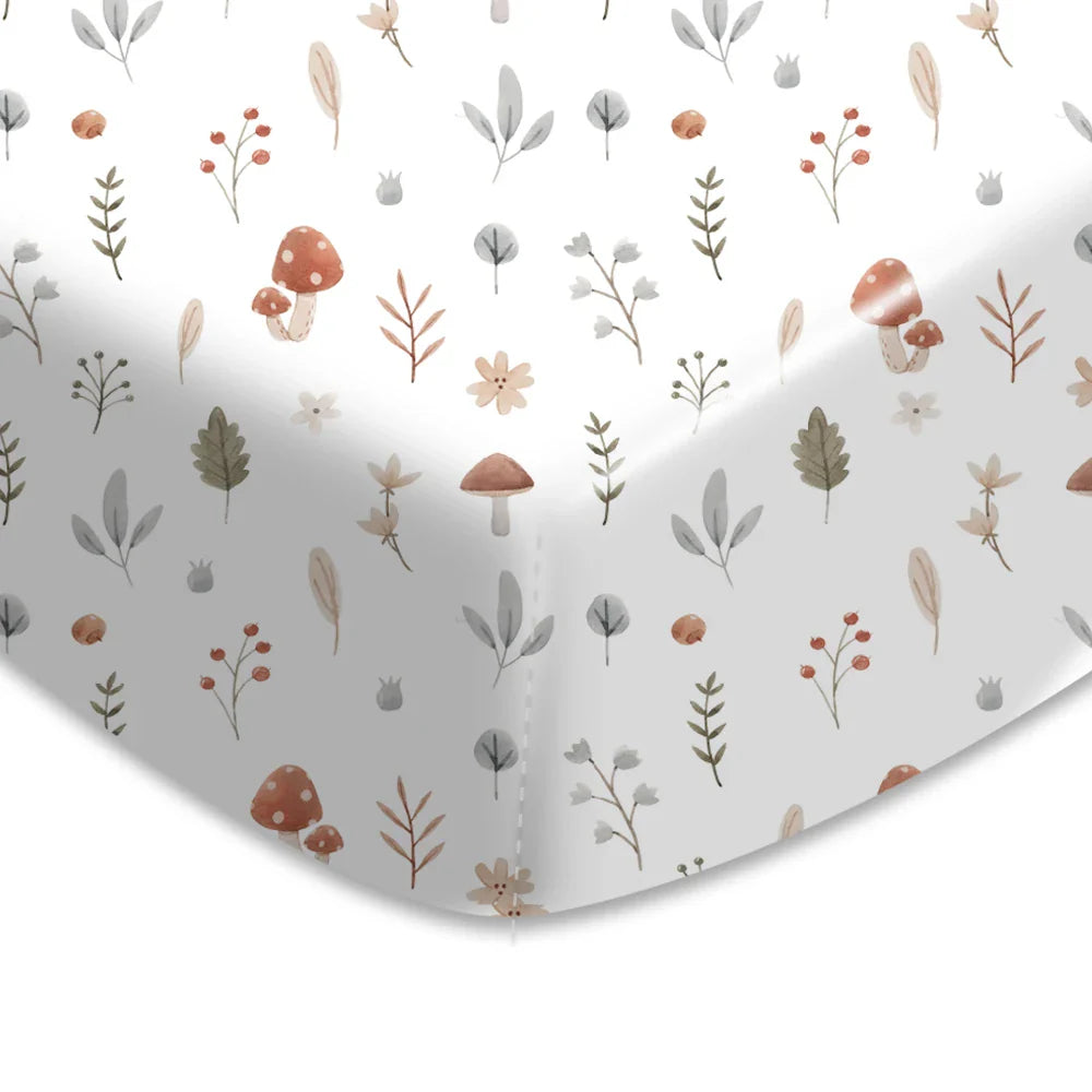 Comfortable baby crib sheet with vibrant cartoon illustrations, breathable material.