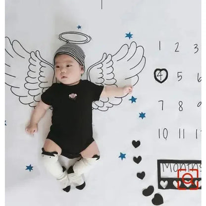 Elegant baby milestone blanket, perfect backdrop for capturing infant's monthly growth journey.