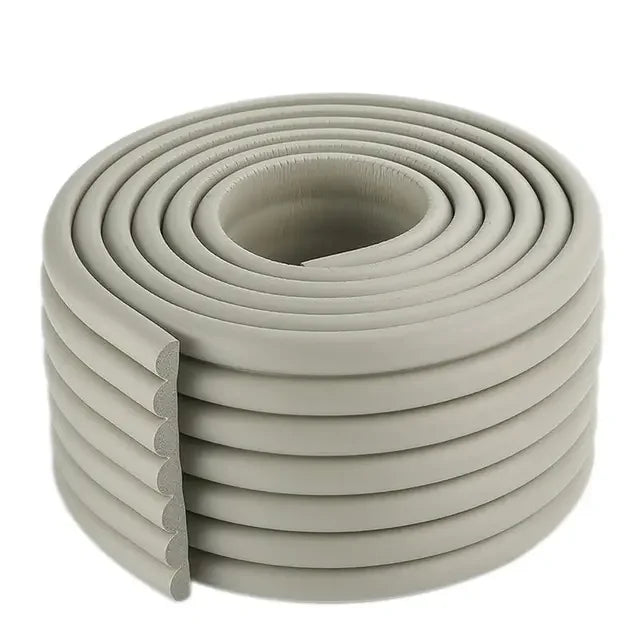 White furniture edge protector foam strip, discreet and effective for child proofing.