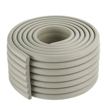 White furniture edge protector foam strip, discreet and effective for child proofing.