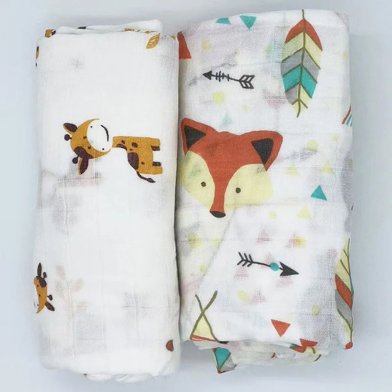Stack of folded bamboo cotton muslin swaddle blankets in various gentle colors, baby essentials