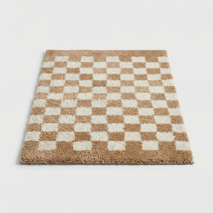 Non-slip checkered bathroom rug, PlushiGrid, designed for safety and soft underfoot comfort.