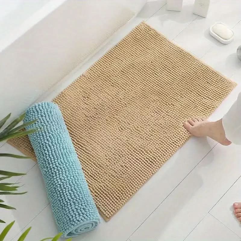Ultra-absorbent chenille bath rug quickly soaks up water, keeping your bathroom floor dry and safe. Soft comfort.