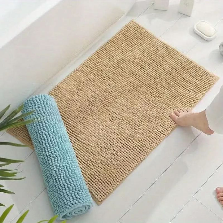 Ultra-absorbent chenille bath rug quickly soaks up water, keeping your bathroom floor dry and safe. Soft comfort.