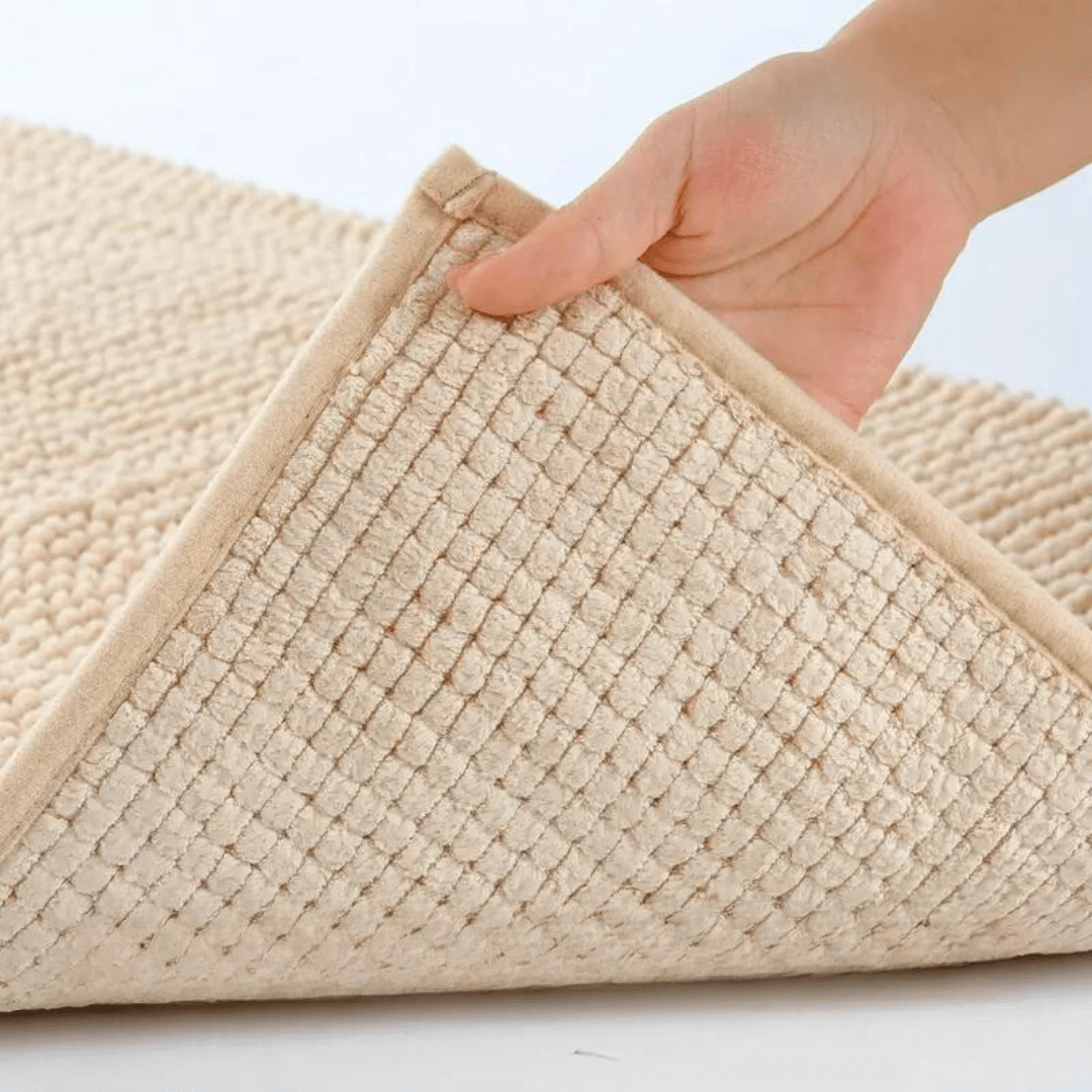 Easy-care machine washable chenille bath rug for bathrooms. Soft, absorbent, & non-slip for convenience and hygiene.