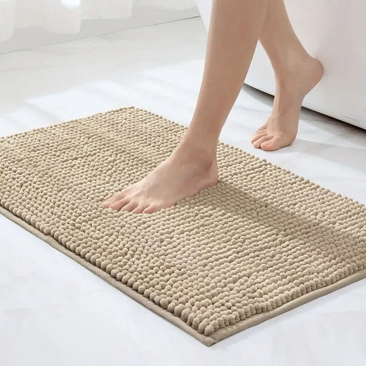 Luxurious soft chenille bath rug offers ultimate comfort underfoot, ultra-absorbent & non-slip for bathroom safety.
