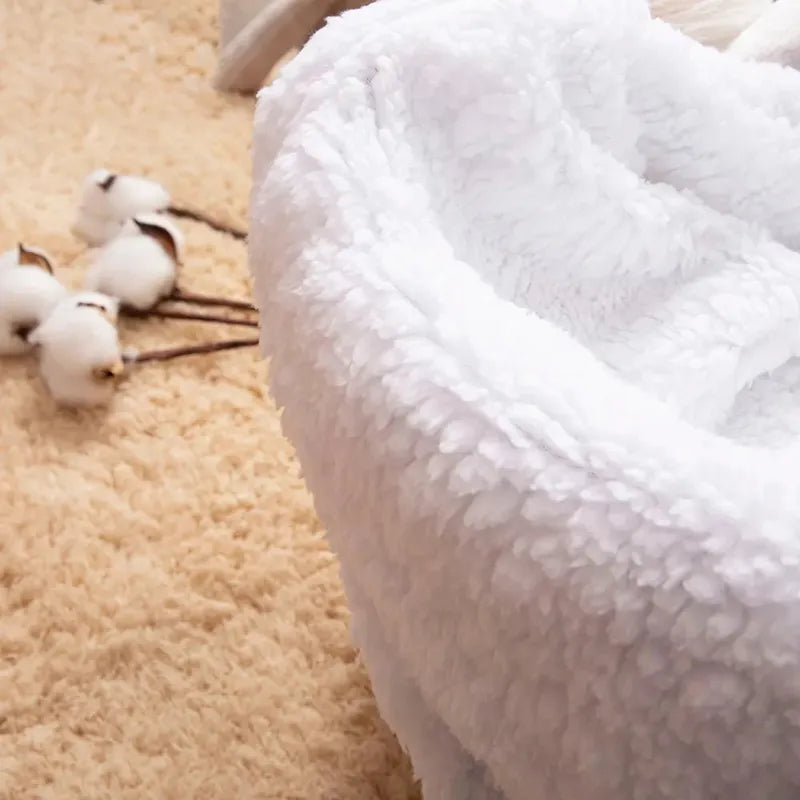 Snuggly crib blanket, providing secure and warm sleep for baby.