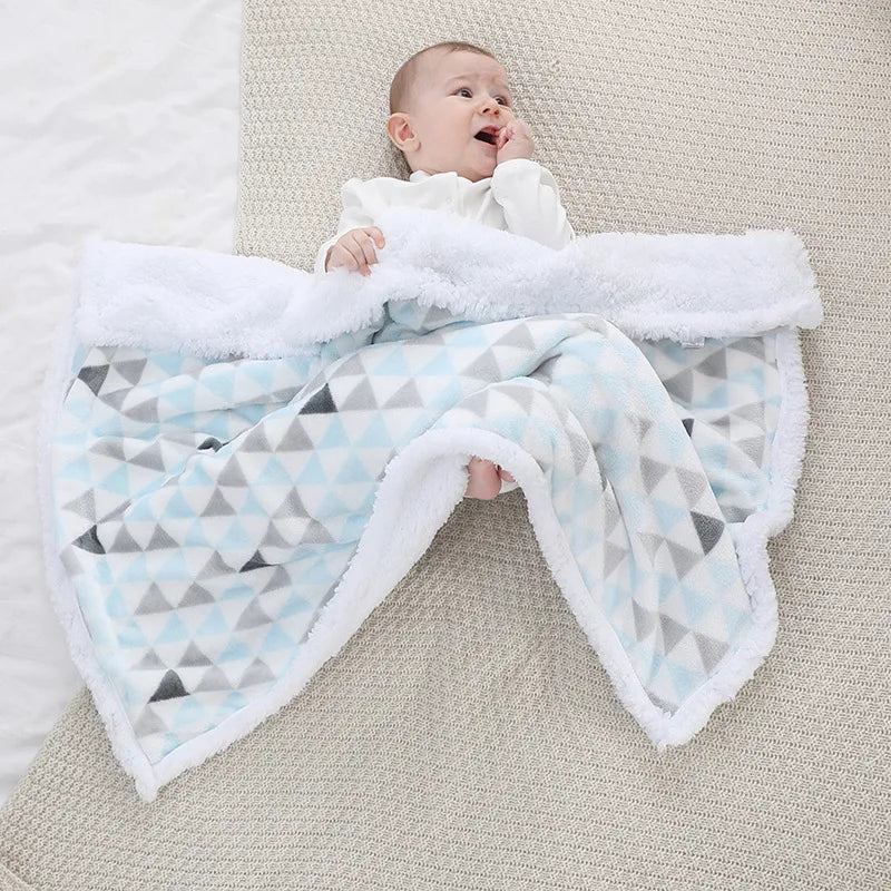 Warm fleece infant blanket, perfect for cribs and travel.