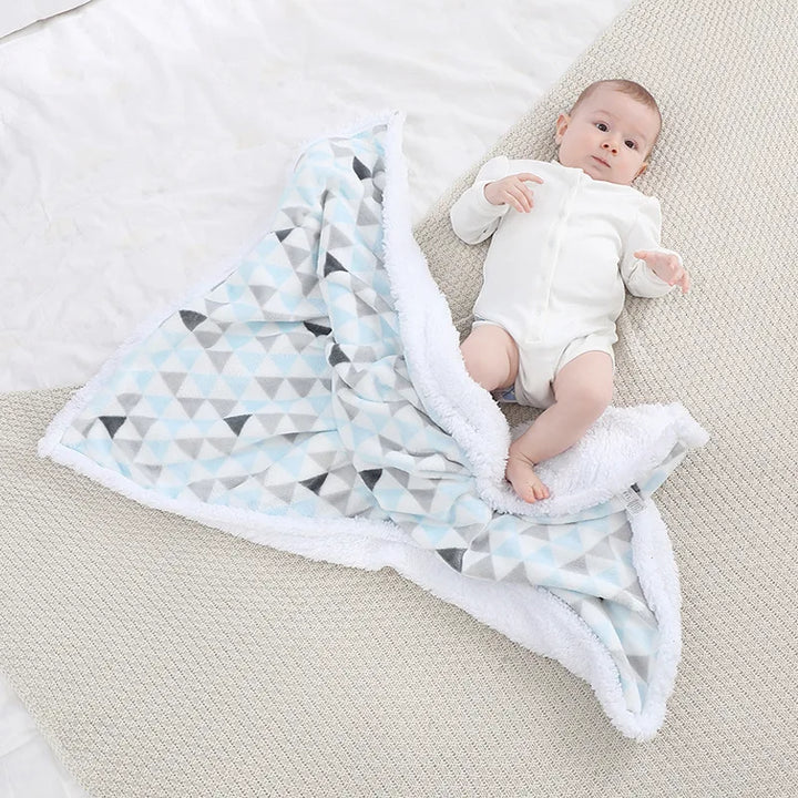 Cozy newborn essentials: soft fleece baby blanket for ultimate comfort.