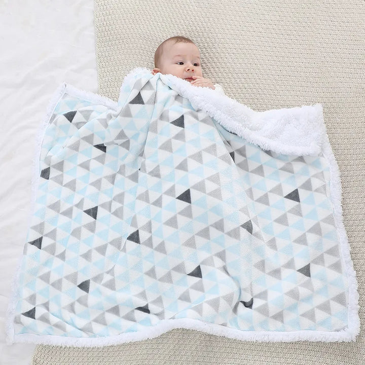 Soft & warm crib blanket, essential for newborn comfort.