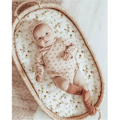 White cotton bassinet sheet, breathable, with elastic corners for a snug crib mattress fit