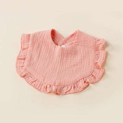 Set of multi-colored cotton baby bibs, designed for feeding ease and comfort during walking practice.