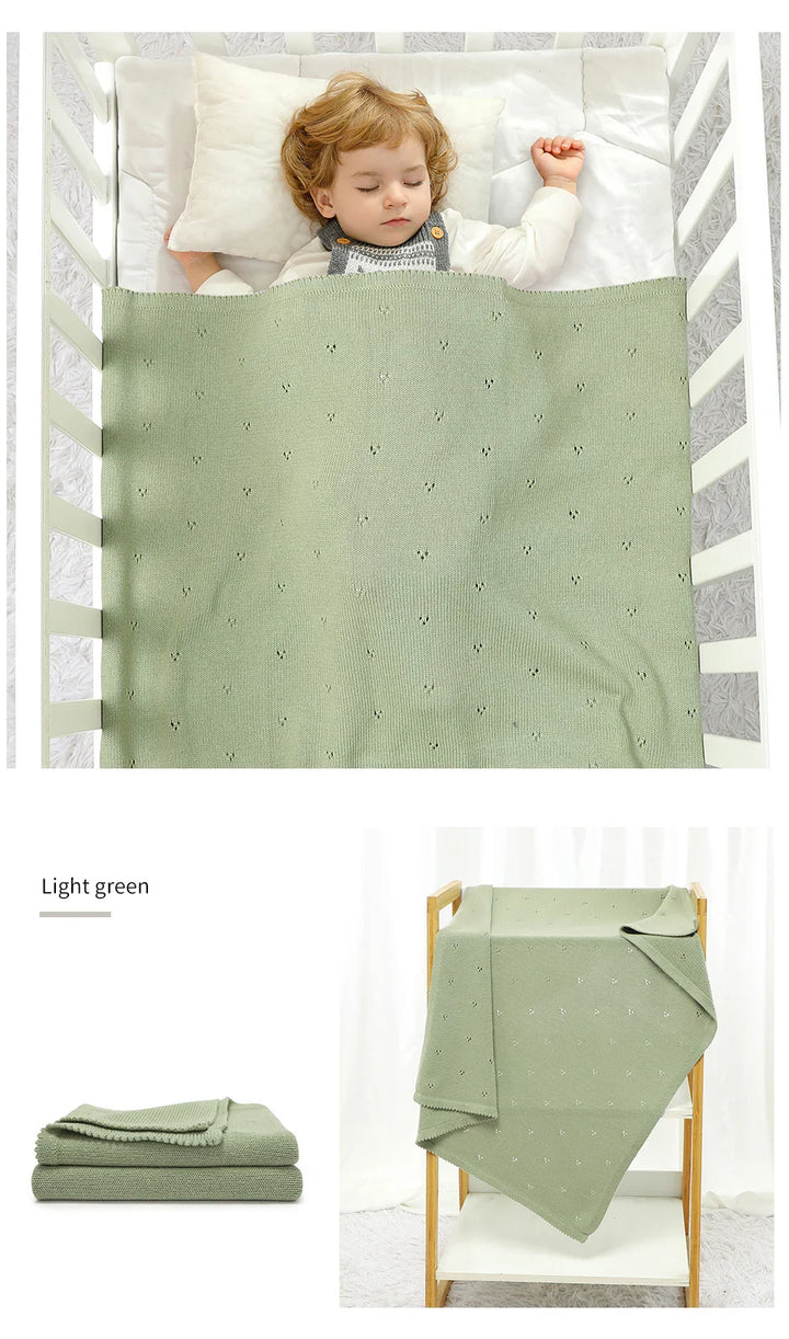 Dreamy soft cotton baby blanket, perfect for soothing newborns to sleep. A comforting essential.