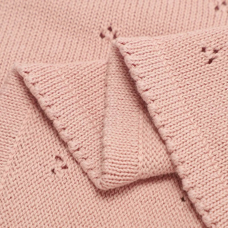 White soft cotton baby blanket, cozy quilt for ultimate newborn comfort. Nursery must-have.