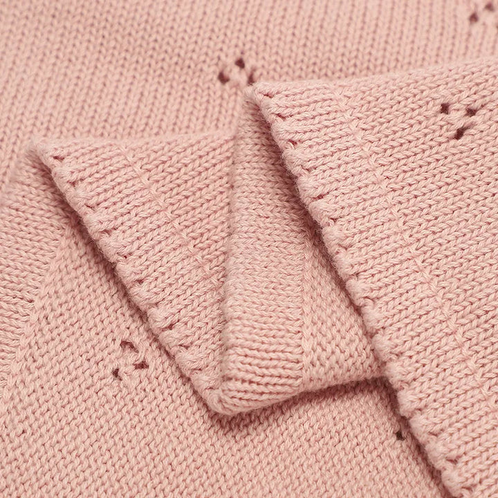 White soft cotton baby blanket, cozy quilt for ultimate newborn comfort. Nursery must-have.