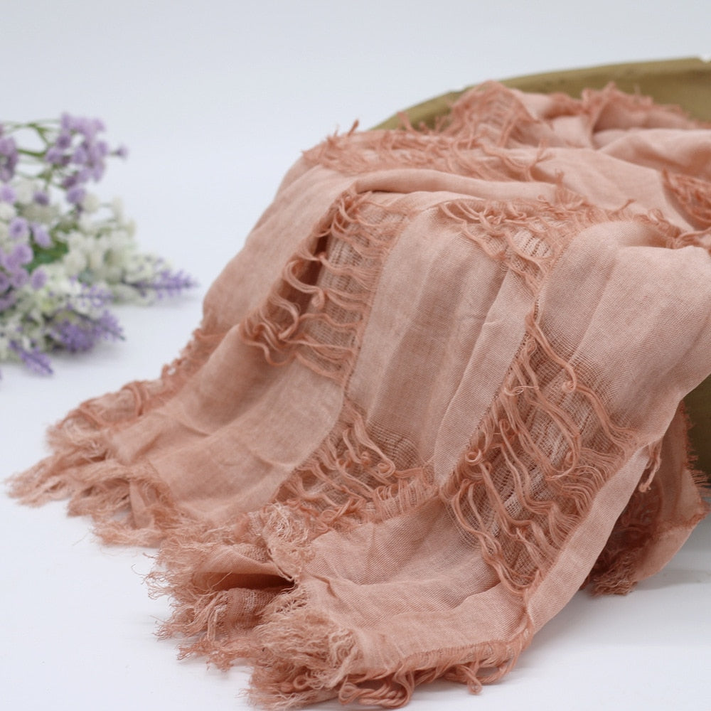 Styled photo of a baby swaddle wrap, great for newborn photography props