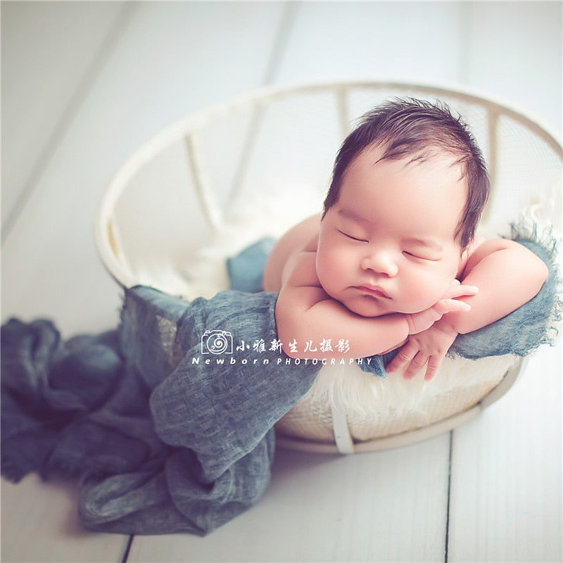Soft swaddle wrap & photography backdrop for calm, cozy baby photos. Neutral design.