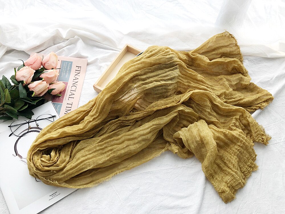 Multipurpose baby accessory: photography prop, gentle swaddle wrap, and comfy blanket.