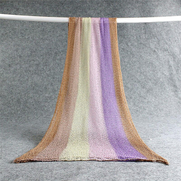 Versatile newborn swaddle blanket, soft stretchy cotton for comforting wrap or photography.