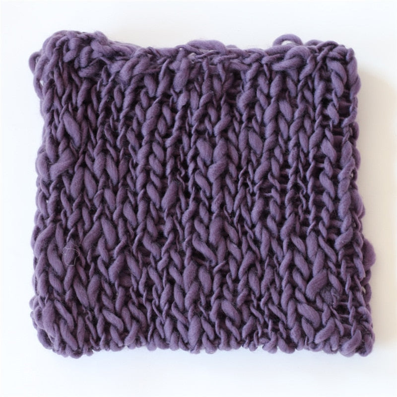 Versatile baby accessory: soft ivory crochet blanket for newborn photos.
