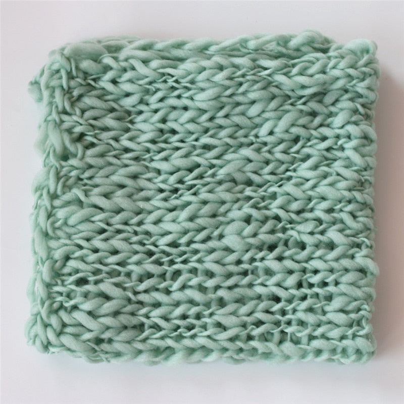 Soft cotton blend newborn blanket, perfect for comfortable baby photography.