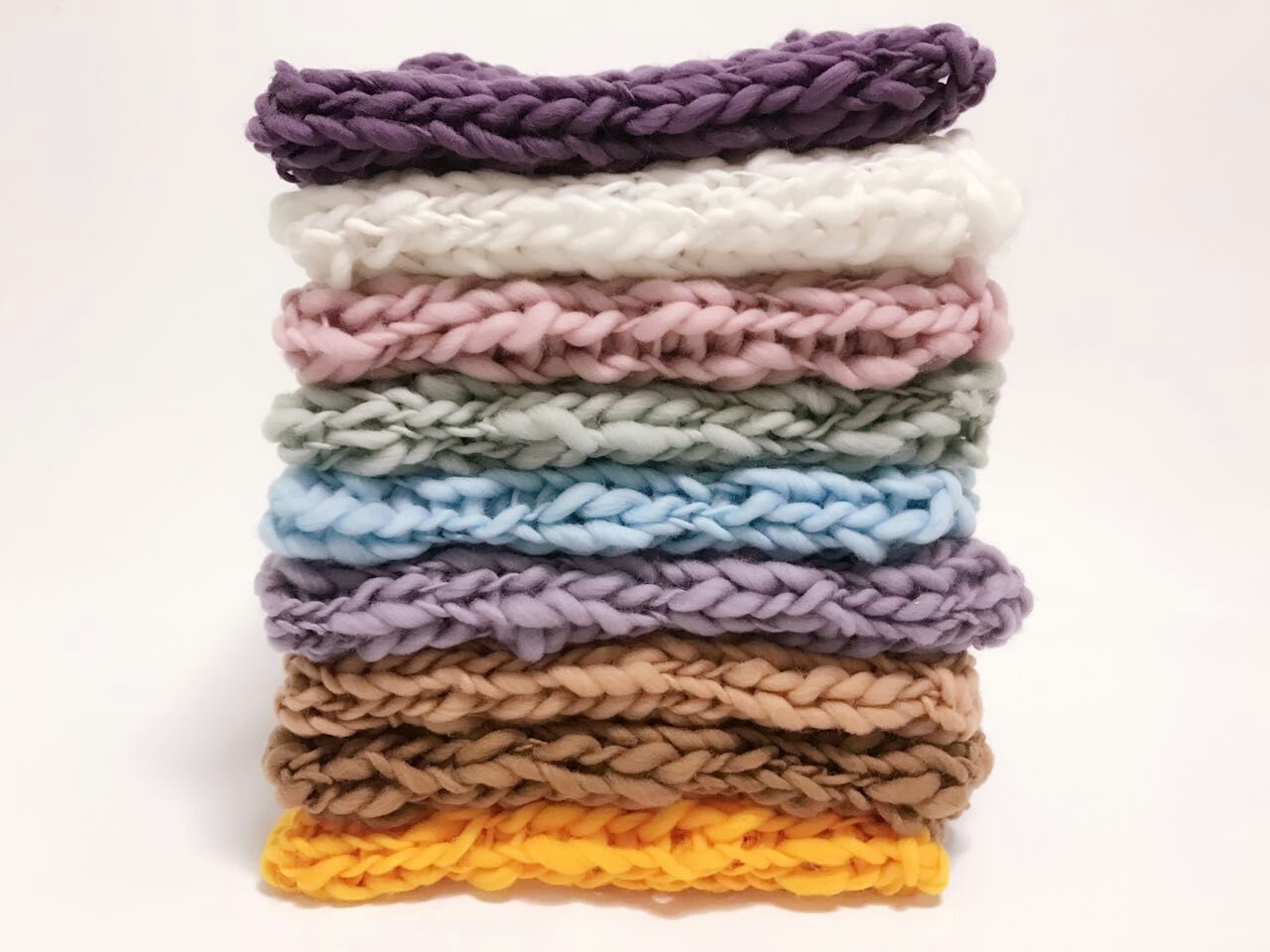 Elegant ivory crochet blanket, a high-quality accessory for baby photo shoots.
