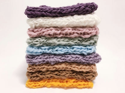 Elegant ivory crochet blanket, a high-quality accessory for baby photo shoots.