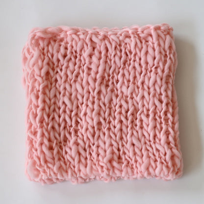 Chunky knit cream blanket, a beautiful and versatile newborn photography prop.