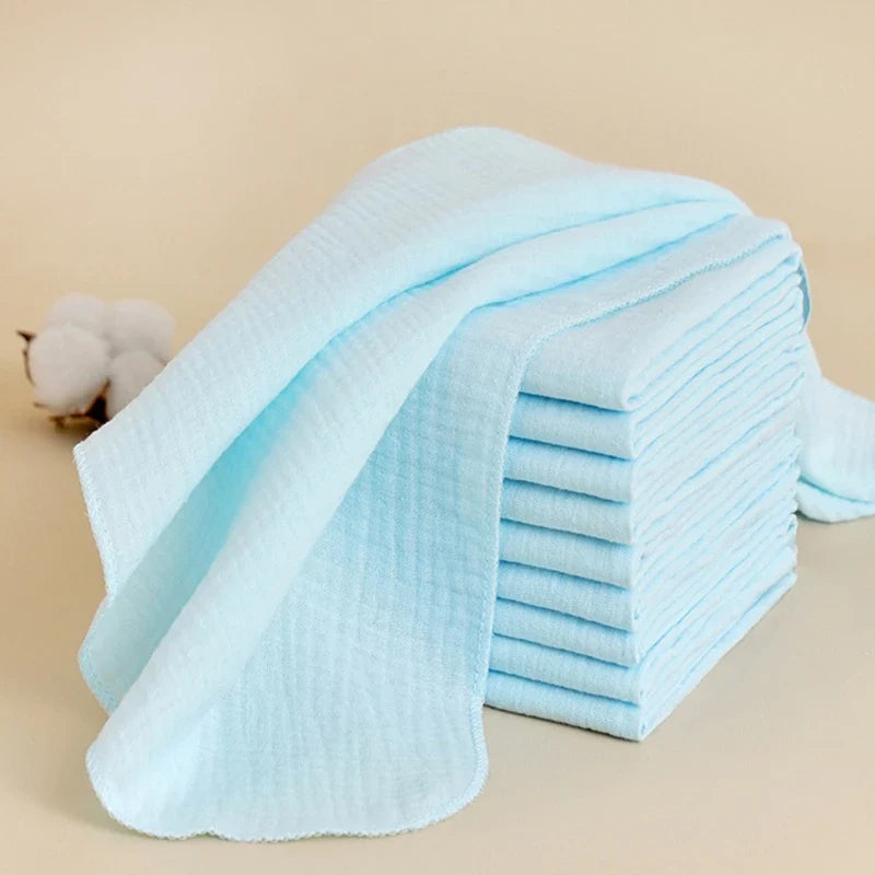 Line of drying reusable cotton gauze diapers, highlighting their washable nature