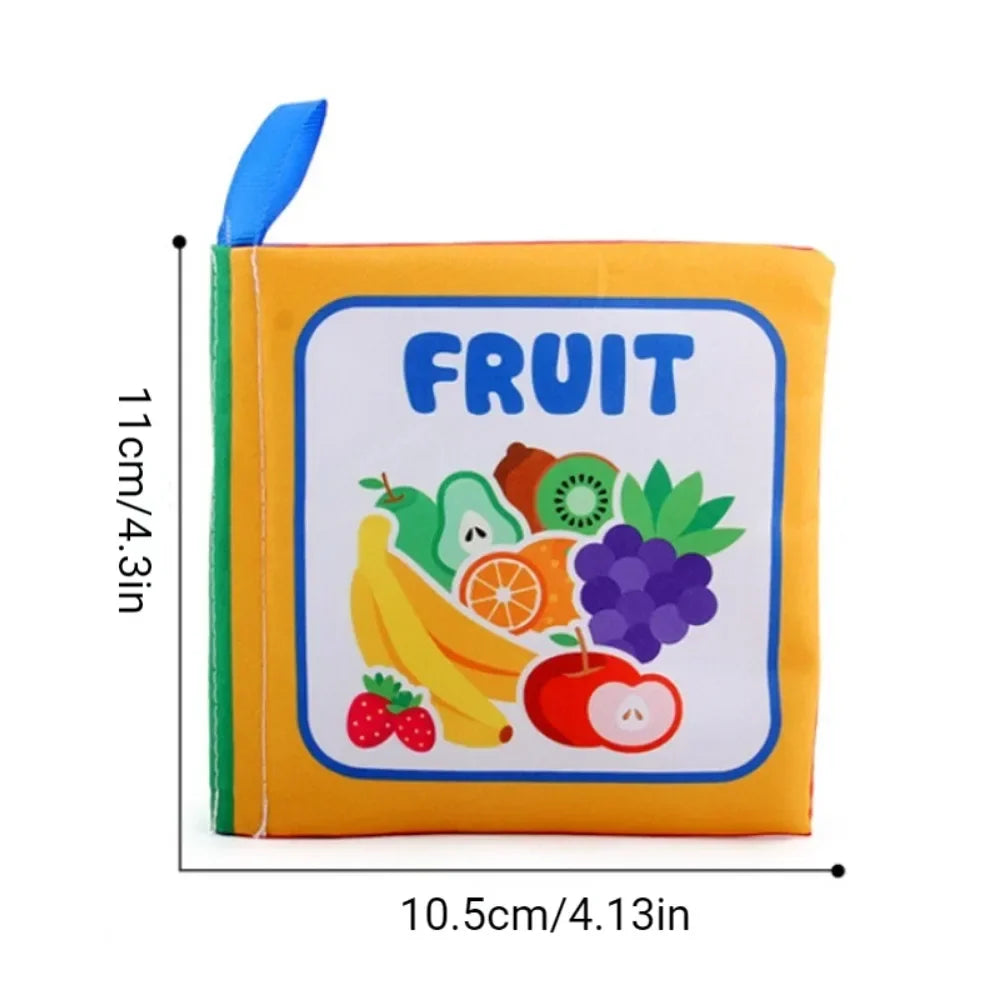 Overhead shot of a baby playing with a crinkling lift-the-flap fabric book, developmental toy